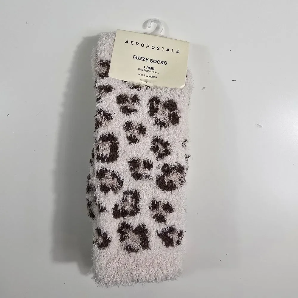 Aeropostale Cream Fuzzy Paw‑Print Socks